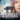 Book cover: woman's face, boy walking on a dock, white flowers.