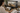 The Renovation Team members reviewing renovation progress on a tablet inside a home renovation project
