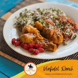 Deviled chicken drumsticks with mulberries and gotukola salad at Vonfidel Ranch