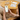 Asian woman holding an iphone with the safeguard-me passport on it