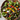 Colorful mixed greens salad with fresh vegetables in a wooden bowl
