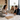 Renovation consultant discussing home renovation plans with homeowners at a kitchen island