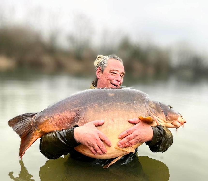 Volker Protzek with a 36.7 kg (80.9 lb) carp landed on Katran Synapse Carp fishing line