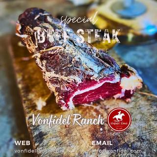 Campfire beef steak prepared for guests at Vonfidel Ranch, highlighting rustic trailside cuisine during a riding holiday in Sri Lanka